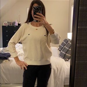 Cream distressed sweatshirt